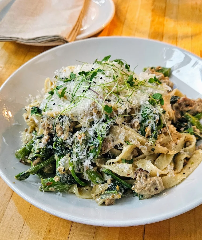 Handmade tagliatelle · pork sugo, pecorino