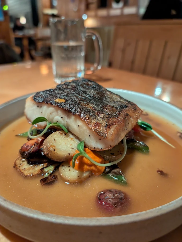 Crispy-skin halibut · smoked broth